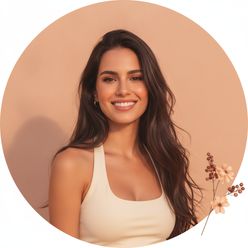 Portrait of Beatriz Costa, a woman with a warm smile, against a soft peach background, highlighting her elegant style.