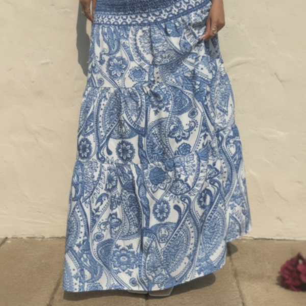 Close-up of the BOHELIA maxi skirt, highlighting its unique print with classic motifs and modern sophistication.